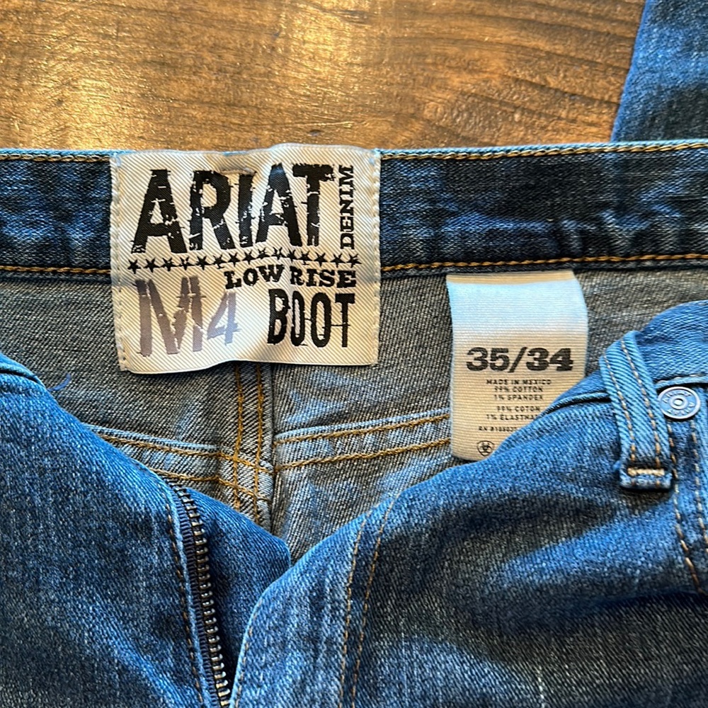 Ariat M4 low rise boot cut.  35x34